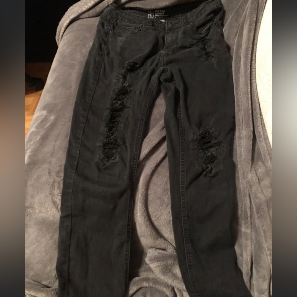 Black holey skinny jeans